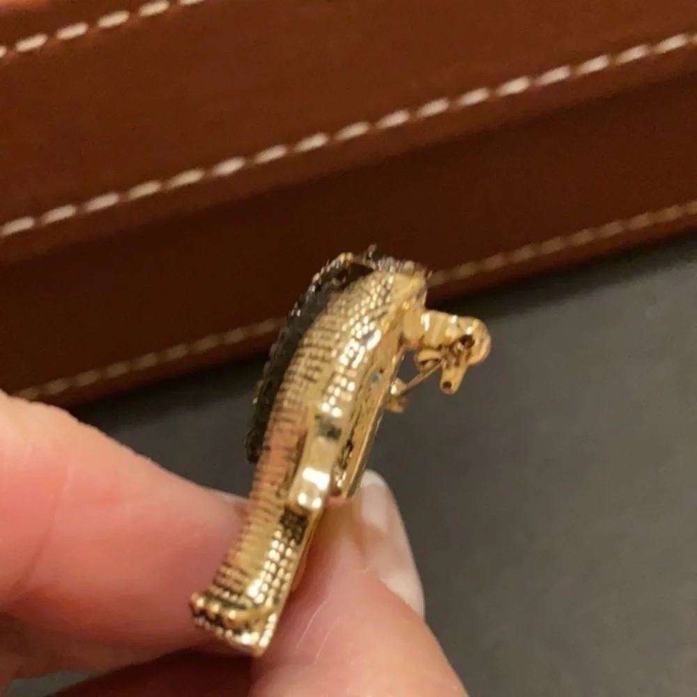 Gorgeous gold tone and crystal elephant brooch
